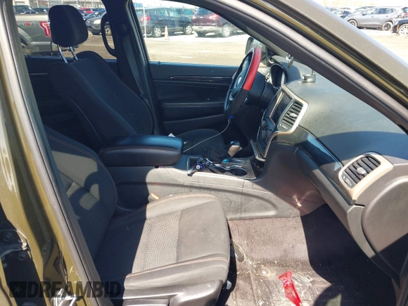 2016 Jeep Grand Cherokee Laredo z VIN 1C4RJFAG2GC454861, wystawiony jako IAAI lot #41964977 z przebiegiem 180 592 mil mil oraz . Historia ofert i sprzedaży dostępna na DreamBid. Obrazek 5.