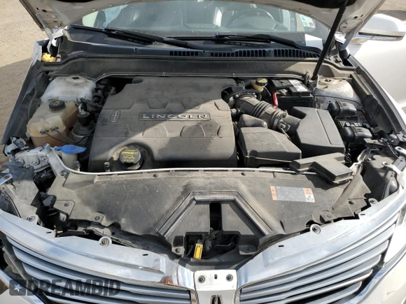2013 Lincoln MKZ с VIN 3LN6L2JK3DR810768, выставлен на аукционе Copart как лот 56665585 с пробегом 172 770 миль миль и Списание • Salvage title. История ставок и продаж доступна на DreamBid. Изображение 11.