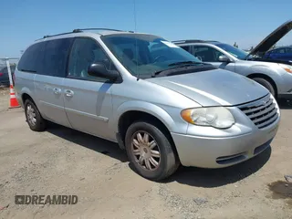 2007 Chrysler Town & Country Touring z VIN 2A8GP54L27R358317, wystawiony jako IAAI lot #42492735 z przebiegiem 138 165 mil mil oraz . Historia ofert i sprzedaży dostępna na DreamBid. Obrazek 1.