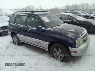 2002 Chevrolet Tracker LT z VIN 2CNBJ634826954251, wystawiony jako IAAI lot #26820731 z przebiegiem 97 296 mil mil oraz . Historia ofert i sprzedaży dostępna na DreamBid. Obrazek 1.
