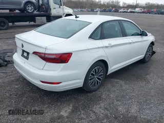 2021 Volkswagen Jetta S z VIN 3VWC57BU7MM098161, wystawiony jako IAAI lot #41954687 z przebiegiem 42 161 mil mil oraz . Historia ofert i sprzedaży dostępna na DreamBid. Obrazek 4.
