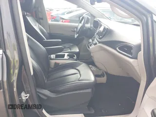 2023 Chrysler Pacifica Touring L with VIN 2C4RC1BG8PR594481, listed as a IAAI auction lot 42618839 with 60,748 mi miles and . Bid and sale history available at DreamBid. Image 5.