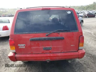 1998 Jeep Cherokee Sport with VIN 1J4FJ68S5WL107496, listed as a Copart auction lot 74401404 with 225,257 mi miles and Salvage Title. Bid and sale history available at carsss.com. Image 6.