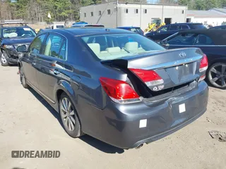 2011 Toyota Avalon with VIN 4T1BK3DBXBU381959, listed as a IAAI auction lot 42029923 with 150,028 mi miles and . Bid and sale history available at carsss.com. Image 3.
