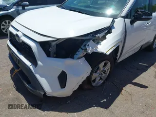 2019 Toyota RAV4 Hybrid LE with VIN 2T3MWRFV2KW026931, listed as a IAAI auction lot 42667582 with 93,147 mi miles and . Bid and sale history available at DreamBid. Image 6.