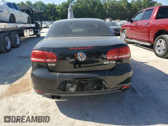 2012 Volkswagen Eos Lux with VIN WVWFW7AH7CV016872, listed as a Copart auction lot 52591415 with 121,130 mi miles and Salvage Title. Bid and sale history available at DreamBid. Image 6.