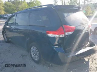 2011 Toyota Sienna XLE AAS with VIN 5TDYK3DC9BS070504, listed as a IAAI auction lot 42046045 with 193,066 mi miles and . Bid and sale history available at DreamBid. Image 3.