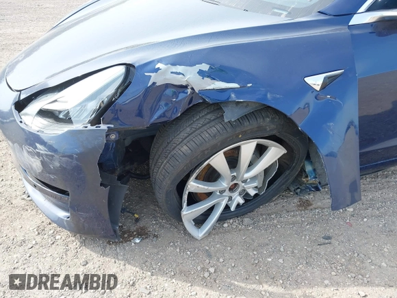 2018 Tesla Model 3 Long Range Battery z VIN 5YJ3E1EB7JF088224, wystawiony jako IAAI lot #42097665 z przebiegiem Nie podano mil oraz . Historia ofert i sprzedaży dostępna na DreamBid. Obrazek 6.