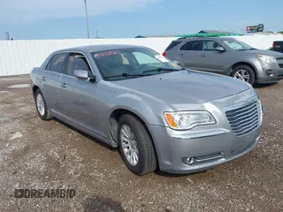 2013 Chrysler 300 with VIN 2C3CCAAG3DH738998, listed as a IAAI auction lot 42688261 with 189,141 mi miles and . Bid and sale history available at DreamBid. Image 1.