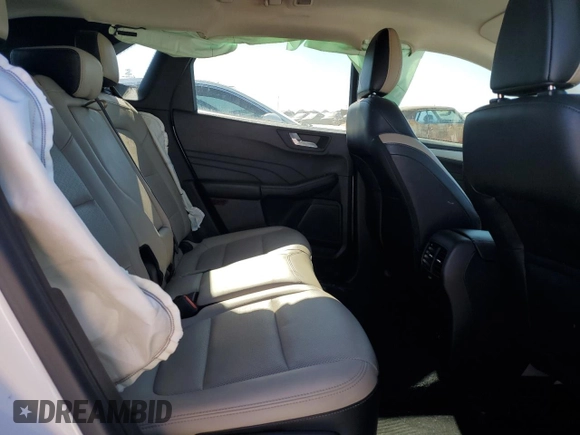 2021 Ford Escape SEL Hybrid z VIN 1FMCU0CZ5MUA52570, wystawiony jako Copart lot #42097635 z przebiegiem 105 059 mil mil oraz Czysty tytuł • Clean title. Historia ofert i sprzedaży dostępna na DreamBid. Obrazek 11.