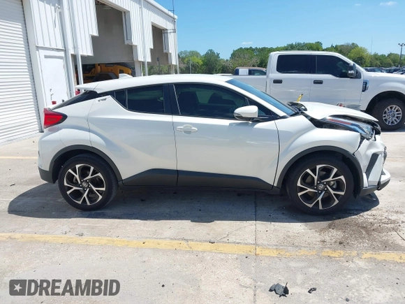 2021 Toyota C-HR LE with VIN JTNKHMBX8M1104427, listed as a IAAI auction lot 41948234 with 24,415 mi miles. Bid and sale history available at carsss.com. Image 13.