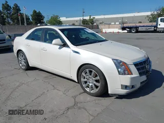 2008 Cadillac CTS RWD z VIN 1G6DV57V280142396, wystawiony jako IAAI lot #42086055 z przebiegiem 183 113 mil mil oraz . Historia ofert i sprzedaży dostępna na DreamBid. Obrazek 1.