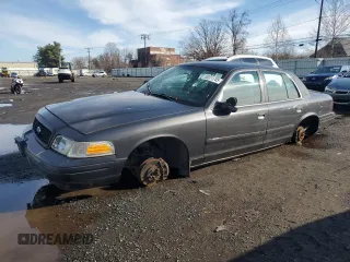 2004 Ford Police Interceptor Base w/3.27 Axle with VIN 2FAFP71W54X126756, listed as a Copart auction lot 50311705 with 135,654 mi miles and Salvage title. Bid and sale history available at DreamBid. Image 1.