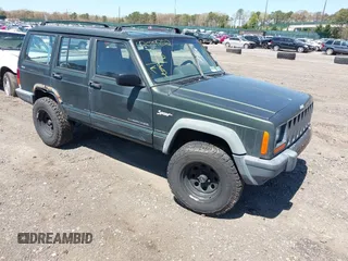 1998 Jeep Cherokee Sport with VIN 1J4FJ68S9WL189992, listed as a IAAI auction lot 42039822 with 156,006 mi miles. Bid and sale history available at carsss.com. Image 1.