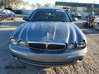 2004 Jaguar X-Type with VIN SAJEA51C74WD70684, listed as a Copart auction lot 46536395 with 155,184 mi miles and Salvage Title. Bid and sale history available at carsss.com. Image 5.