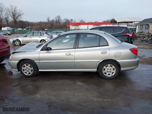 2001 Kia Rio with VIN KNADC123716042067, listed as a IAAI auction lot 41449479 with 113,108 mi miles. Bid and sale history available at carsss.com. Image 14.