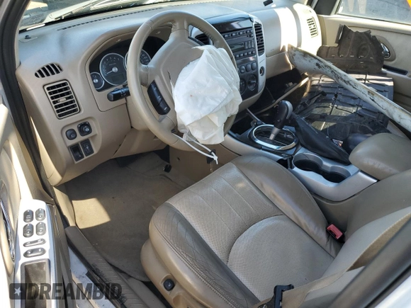 2005 Mercury Mariner Luxury z VIN 4M2CU57115DJ01538, wystawiony jako Copart lot #48695925 z przebiegiem Nie podano mil oraz Szkody całkowita. Historia ofert i sprzedaży dostępna na DreamBid. Obrazek 8.
