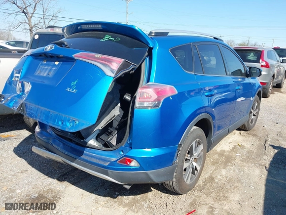 2016 Toyota RAV4 XLE with VIN JTMWFREV3GJ098415, listed as a IAAI auction lot 41866800 with 97,440 mi miles. Bid and sale history available at carsss.com. Image 4.