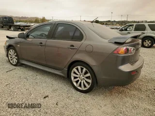 2011 Mitsubishi Lancer GTS with VIN JA32U8FW2BU005251, listed as a Copart auction lot 70879824 with 124,317 mi miles and Salvage Title. Bid and sale history available at carsss.com. Image 2.