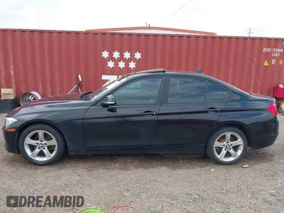 2015 BMW 3 Series 328i with VIN WBA3C1C5XFP852807, listed as a IAAI auction lot 42043565 with 120,048 mi miles and . Bid and sale history available at carsss.com. Image 14.