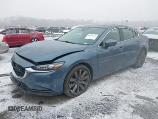 2018 Mazda 6 Grand Touring with VIN JM1GL1TY5J1330614, listed as a IAAI auction lot 41354444 with 100,744 mi miles and . Bid and sale history available at DreamBid. Image 6.