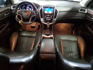 2014 Cadillac SRX Performance Collection with VIN 3GYFNFE34ES583362, listed as a Copart auction lot 61966535 with 145,954 mi miles and Non repairable. Bid and sale history available at DreamBid. Image 8.