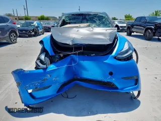 2024 Tesla Model Y Long Range z VIN 7SAYGDEE3RA238059, wystawiony jako Copart lot #61395925 z przebiegiem 14 991 mil mil oraz Szkoda całkowita • Salvage title. Historia ofert i sprzedaży dostępna na DreamBid. Obrazek 5.
