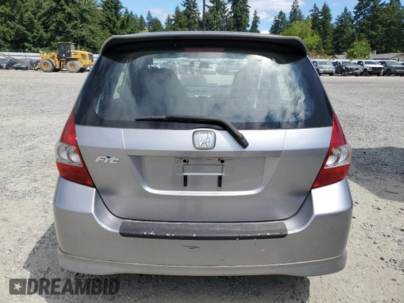 2007 Honda Fit Sport with VIN JHMGD37617S043208, listed as a Copart auction lot 64594825 with 210,672 mi miles and Clean title. Bid and sale history available at DreamBid. Image 6.