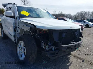 2018 Jeep Grand Cherokee Laredo E with VIN 1C4RJEAG3JC300760, listed as a IAAI auction lot 41811734 with 131,406 mi miles. Bid and sale history available at carsss.com. Image 6.