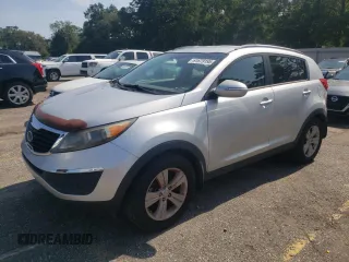 2012 Kia Sportage LX with VIN KNDPB3A28C7257784, listed as a Copart auction lot 61679195 with 199,947 mi miles and Salvage title. Bid and sale history available at DreamBid. Image 1.