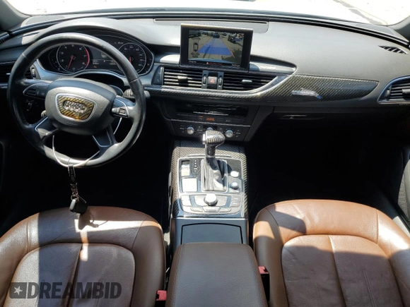 2012 Audi A6 Premium Plus with VIN WAUGGAFC5CN127963, listed as a Copart auction lot 63074335 with 140,979 mi miles and Salvage title. Bid and sale history available at DreamBid. Image 8.