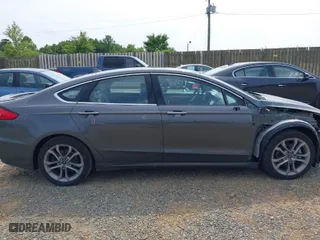 2020 Ford Fusion Hybrid Titanium with VIN 3FA6P0RU0LR141494, listed as a IAAI auction lot 39967898 with 88,152 mi miles. Bid and sale history available at carsss.com. Image 14.