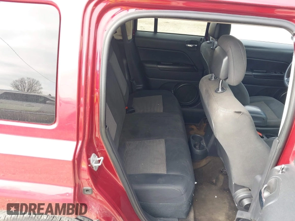 2015 Jeep Patriot Sport with VIN 1C4NJRBBXFD214047, listed as a IAAI auction lot 41976498 with 144,950 mi miles and . Bid and sale history available at carsss.com. Image 8.
