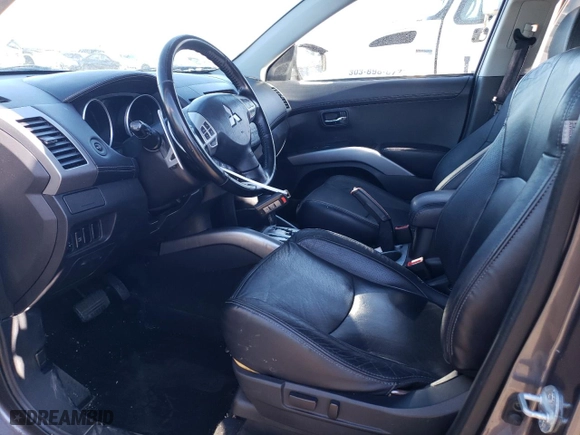 2010 Mitsubishi Outlander XLS with VIN JA4JT4AX7AZ005377, listed as a Copart auction lot 82234564 with 250,831 mi miles and Salvage Title. Bid and sale history available at carsss.com. Image 7.