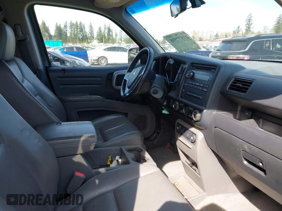 2009 Honda Ridgeline RTL with VIN 5FPYK16599B100707, listed as a IAAI auction lot 41877598 with 130,622 mi miles and . Bid and sale history available at DreamBid. Image 5.