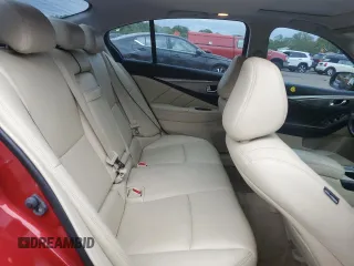 2015 Infiniti Q50 with VIN JN1BV7AR0FM396516, listed as a Copart auction lot 57677055 with 128,369 mi miles and Salvage title. Bid and sale history available at DreamBid. Image 10.