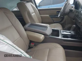 2015 Nissan Armada SV z VIN 5N1BA0ND7FN612818, wystawiony jako IAAI lot #41459324 z przebiegiem 100 326 mil mil oraz . Historia ofert i sprzedaży dostępna na DreamBid. Obrazek 5.