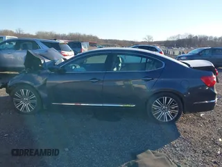 2015 Kia Cadenza Premium with VIN KNALN4D73F5194464, listed as a IAAI auction lot 41036049 with 164,907 mi miles. Bid and sale history available at carsss.com. Image 13.