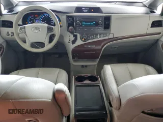 2011 Toyota Sienna XLE AAS with VIN 5TDYK3DC8BS024209, listed as a Copart auction lot 58923715 with 134,051 mi miles and Salvage title. Bid and sale history available at DreamBid. Image 8.