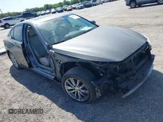 2014 Infiniti Q50 Hybrid Premium with VIN JN1AV7ARXEM703202, listed as a IAAI auction lot 41889569 with 144,749 mi miles. Bid and sale history available at carsss.com. Image 1.