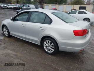 2011 Volkswagen Jetta SE with VIN 3VWDZ7AJ4BM387236, listed as a IAAI auction lot 41875995 with 202,028 mi miles and . Bid and sale history available at DreamBid. Image 3.