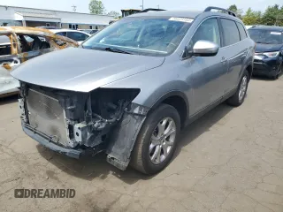 2014 Mazda CX-9 Touring z VIN JM3TB3CV0E0436460, wystawiony jako Copart lot #56023165 z przebiegiem 97 966 mil mil oraz Szkoda całkowita • Salvage title. Historia ofert i sprzedaży dostępna na DreamBid. Obrazek 1.