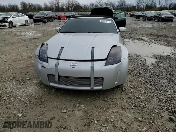 2004 Nissan 350Z Enthusiast z VIN JN1AZ36A74T013105, wystawiony jako Copart lot #82797874 z przebiegiem Nie podano mil oraz Szkoda całkowita • Salvage title. Historia ofert i sprzedaży dostępna na DreamBid. Obrazek 11.