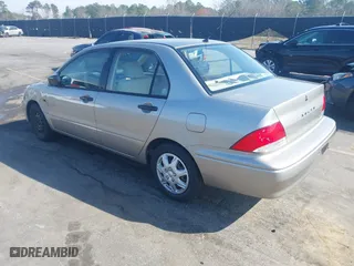 2003 Mitsubishi Lancer ES with VIN JA3AJ26E63U007501, listed as a IAAI auction lot 41771016 with 146,984 mi miles. Bid and sale history available at carsss.com. Image 3.