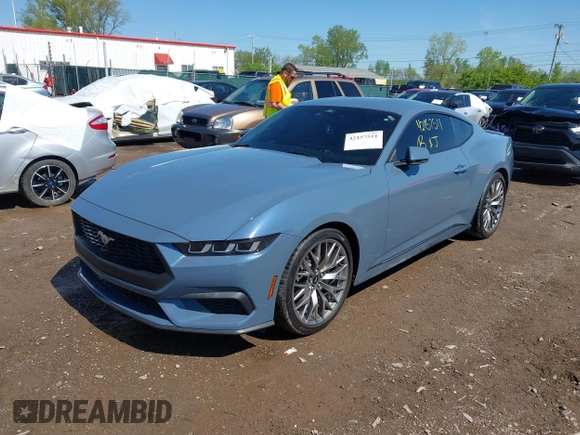 2024 Ford Mustang EcoBoost with VIN 1FA6P8TH8R5140468, listed as a IAAI auction lot 42157511 with 9,559 mi miles and . Bid and sale history available at DreamBid. Image 2.
