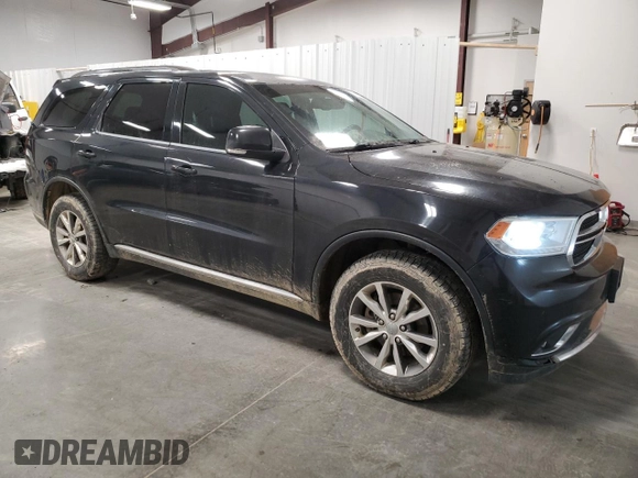2015 Dodge Durango Limited with VIN 1C4RDJDG6FC931344, listed as a Copart auction lot 51929195 with 178,055 mi miles and Salvage title. Bid and sale history available at DreamBid. Image 4.
