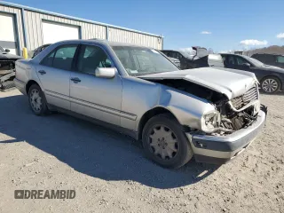 1999 Mercedes-Benz E-Class with VIN WDBJF82H3XX025477, listed as a Copart auction lot 78813364 with 235,541 mi miles and Salvage Title. Bid and sale history available at carsss.com. Image 4.