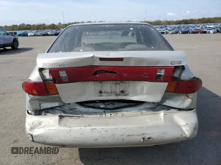 1996 Nissan Sentra XE z VIN 3N1AB41D5TL010573, wystawiony jako Copart lot #47284155 z przebiegiem 158 185 mil mil oraz Szkoda całkowita • Salvage title. Historia ofert i sprzedaży dostępna na DreamBid. Obrazek 6.