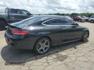 2018 Mercedes-Benz C 300 with VIN WDDWJ4KB6JF704074, listed as a Copart auction lot 57957375 with 97,267 mi miles and Salvage title. Bid and sale history available at DreamBid. Image 3.