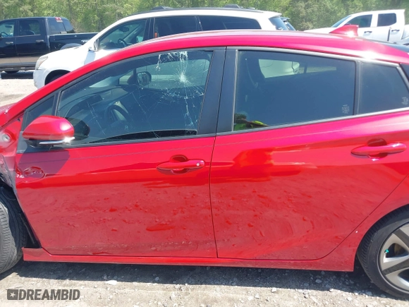 2021 Toyota Prius L Eco with VIN JTDKAMFU3M3138708, listed as a IAAI auction lot 42006401 with 38,876 mi miles. Bid and sale history available at carsss.com. Image 15.